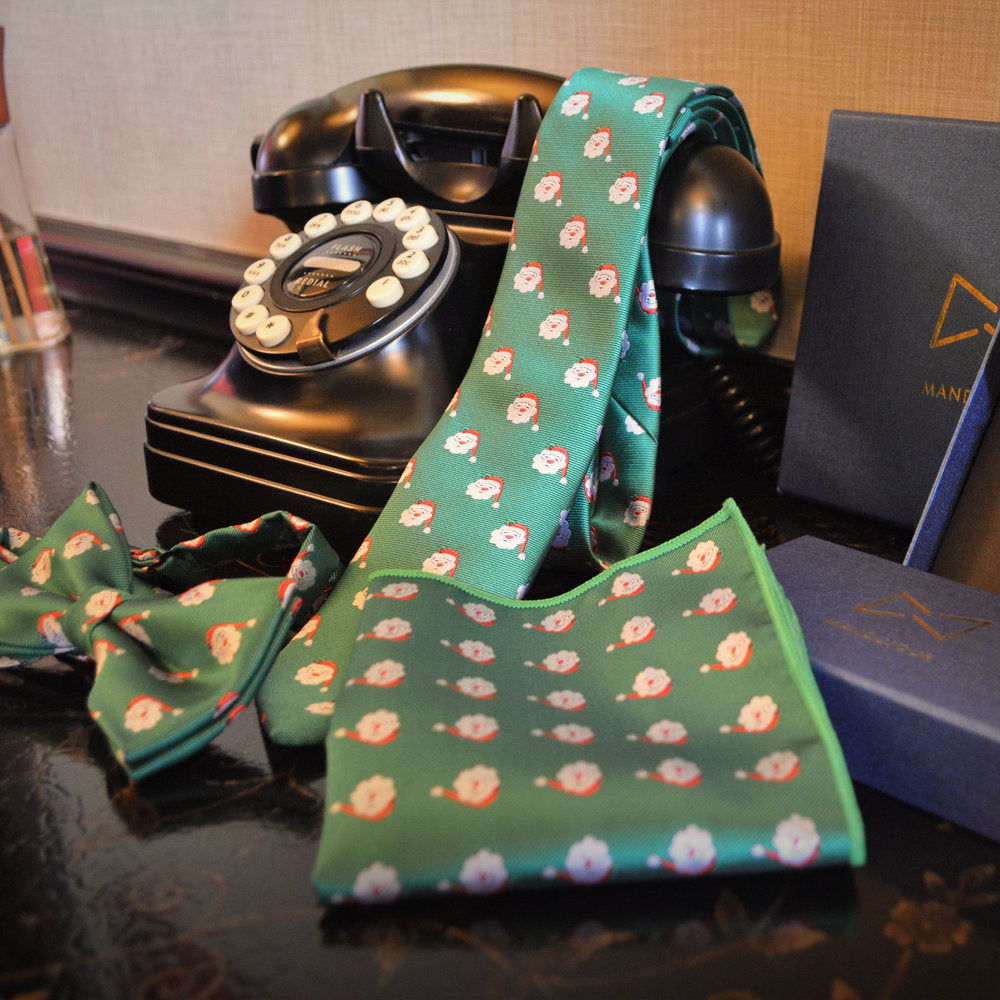Green patterned necktie and pocket square