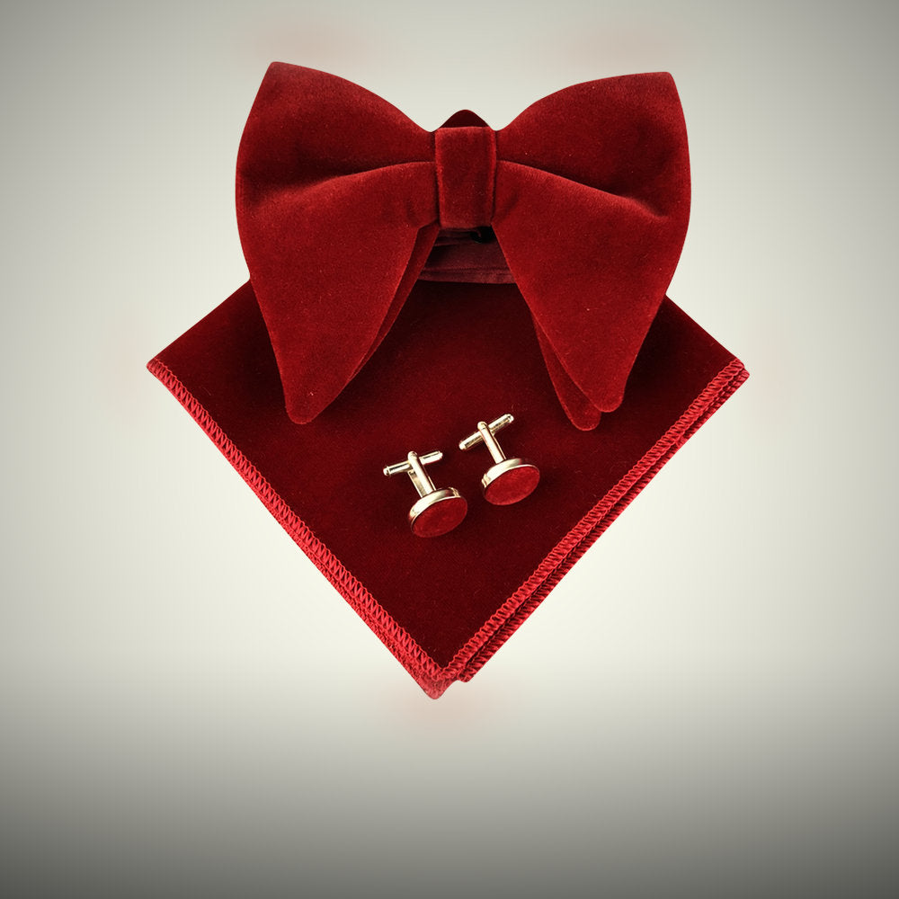 Burgundy velvet bow tie with cufflinks and pocket square